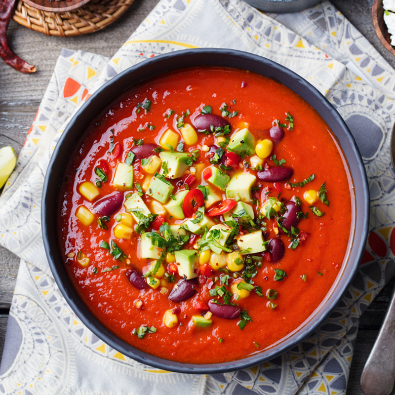 A bowl of tomato and bean soup