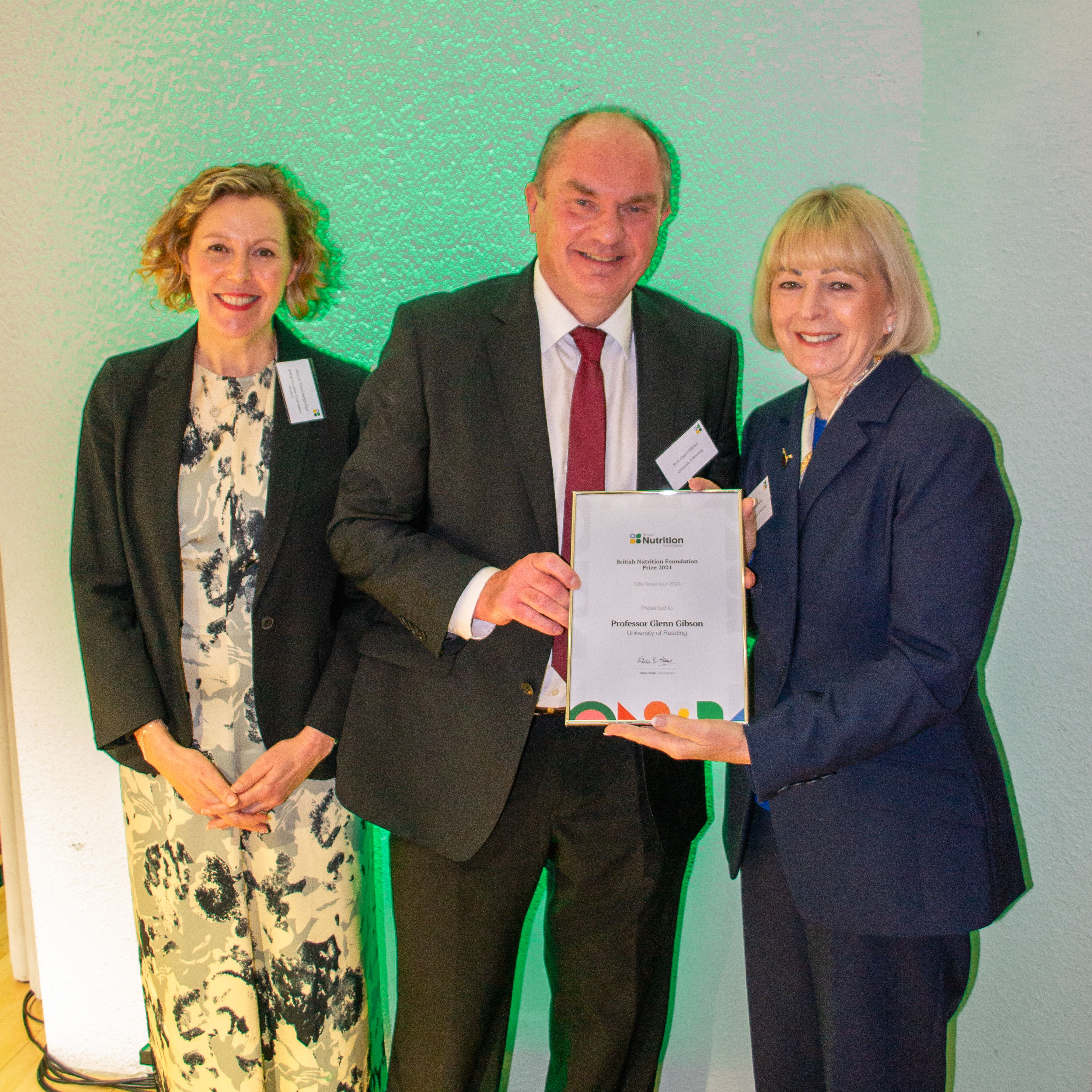 A photo of Professor Glenn Gibson receiving his award at the BNF Annual Conference loading=
