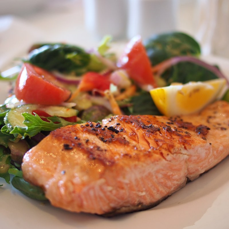 A meal of salmon and vegetables