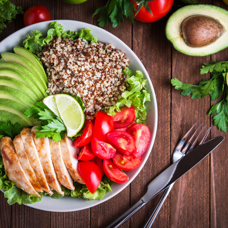 A meal of chicken, quinoa and vegetables