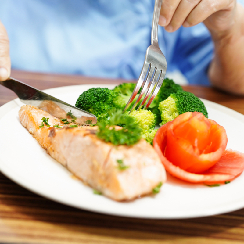 A meal of salmon and vegetables